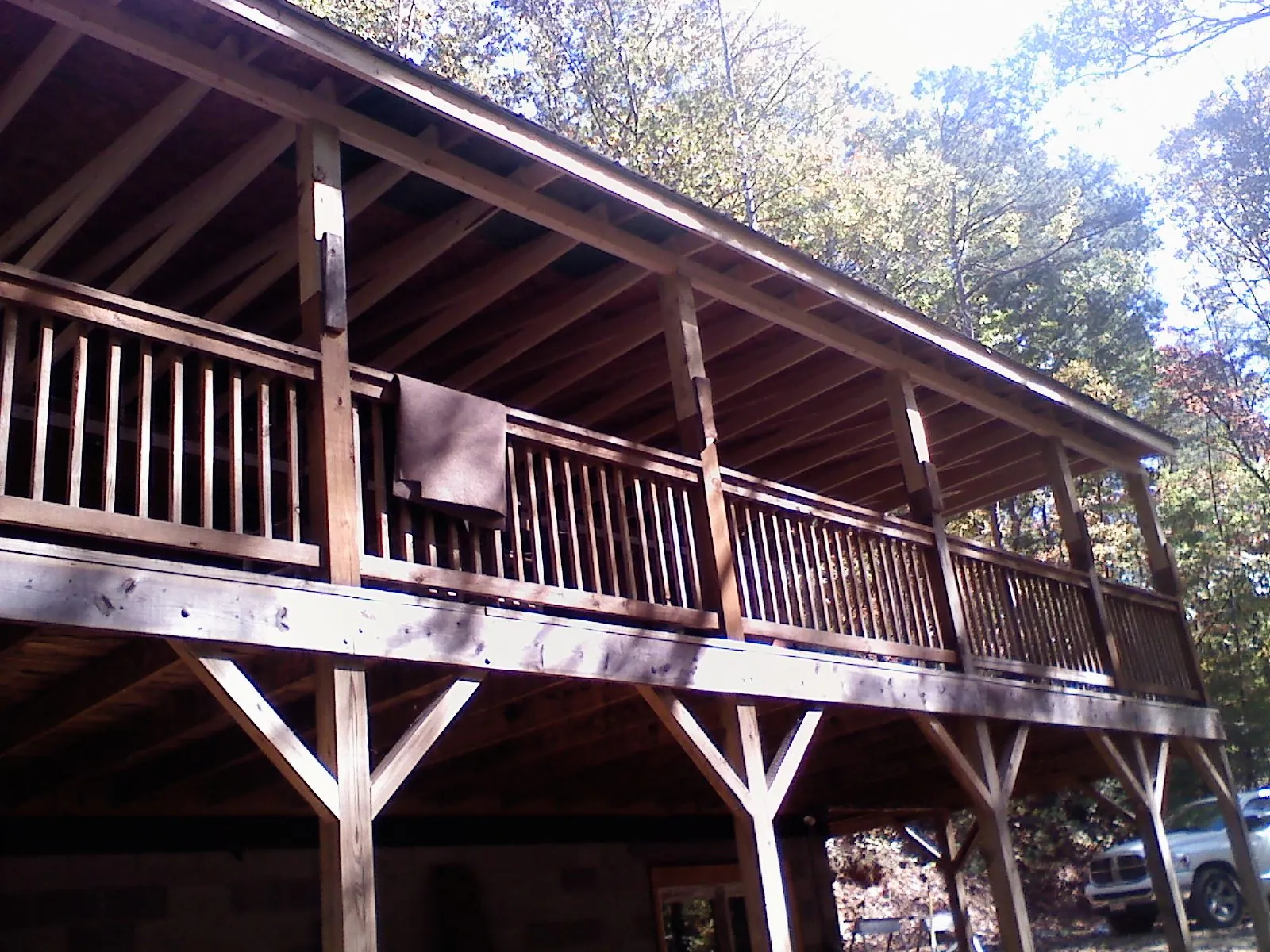 Timber framing under a new elevated porch and deck — Roof Leak Repair in Rose Creek by Roofing Brothers